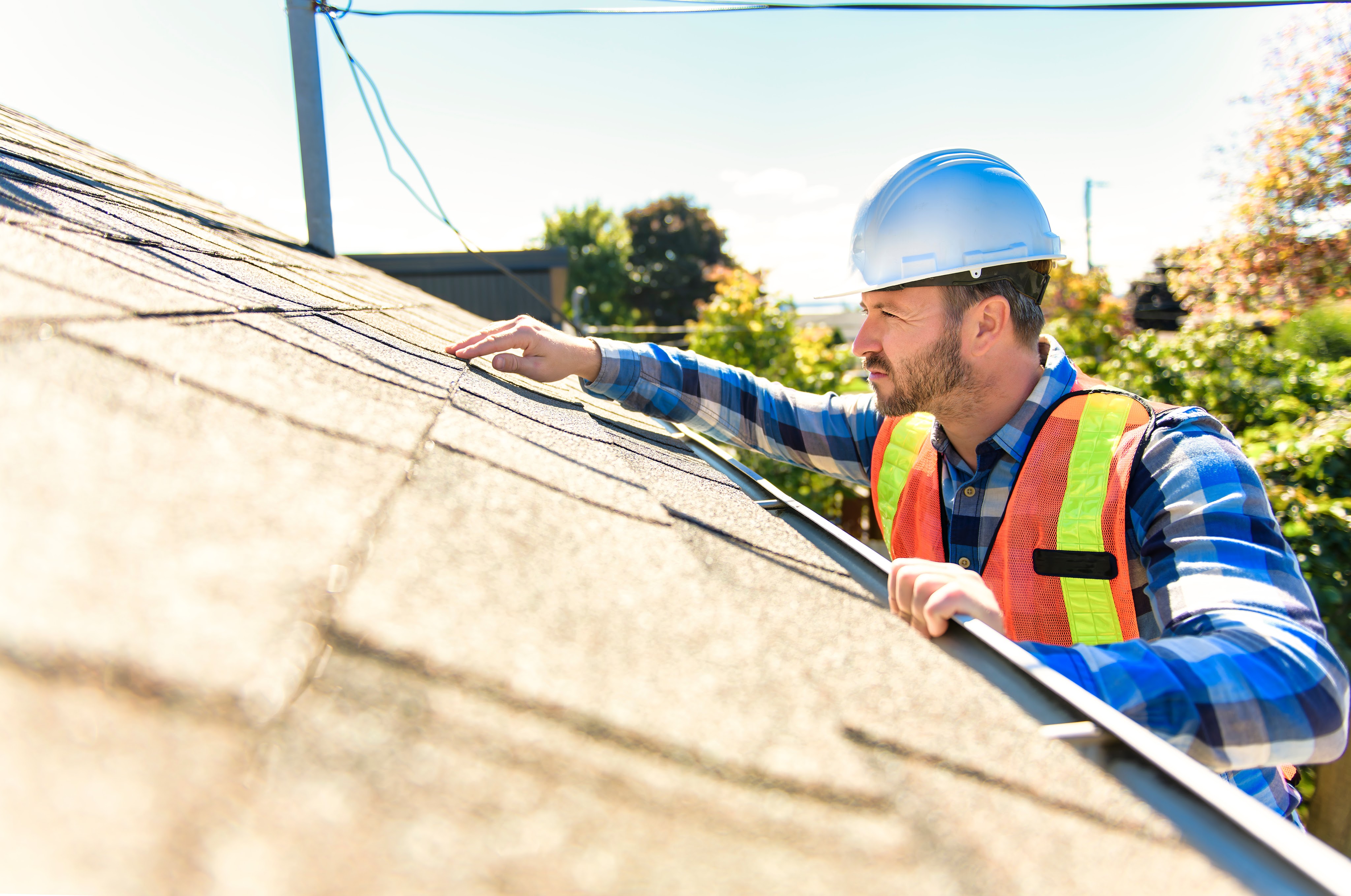 Black rooftop solar array installed on architectural shingles by Helio GC